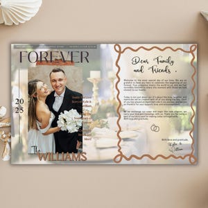 May include: A wedding magazine cover with the word "FOREVER" in large letters. The cover features a photo of a smiling couple, with the text "The Williams" at the bottom. The magazine includes text that reads "Dear Family and Friends."