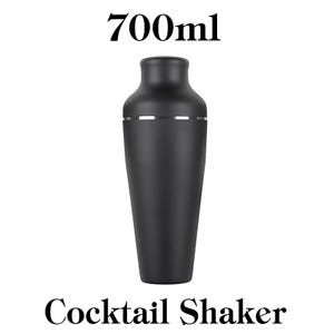 May include: A matte black cocktail shaker with a silver band near the top. The text "700ml" is above the shaker, and "Cocktail Shaker" is below. The shaker has a tapered design and is likely made of metal.