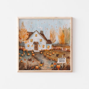 May include: Watercolor painting of a white house with a brown roof, surrounded by pumpkins and fall foliage. A sign reads "Pumpkin Patch." The artwork is framed in a light wood frame, evoking a cozy autumn scene.