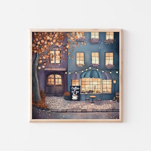 Può includere: Dipinto ad acquerello di un'incantevole caffetteria con facciata blu, tenda da sole e luci a corda. Un cartello recita "Coffee to go". Un albero con foglie arancioni incornicia il negozio. L'opera è incorniciata in una cornice di legno.
