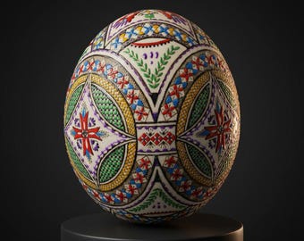 May include: A decorative egg with intricate patterns in red, blue, green, yellow, and purple. The egg is white with detailed floral and geometric designs. It is displayed on a black pedestal against a dark background.