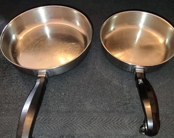 Dos sartenes Farberware vintage de acero inoxidable revestidas de aluminio