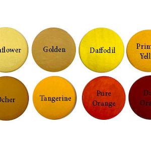 May include: Eight paint colour swatches in round circles, showing shades of yellow and orange. The colours are labelled: Sunflower, Golden, Daffodil, Primary Yellow, Ocher, Tangerine, Pure Orange, and Dark Orange.