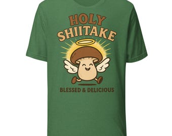 Maglietta con il simbolo del sacro fungo shiitake / Divertente gioco di parole sui funghi / Angelo dei cartoni animati con il simbolo del fungo shiitake con lo slogan "Benedetto e delizioso"