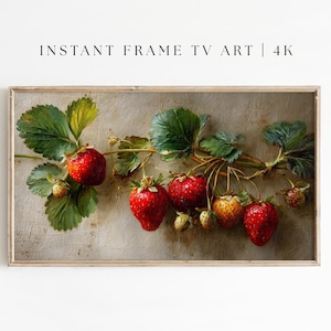 Könnte beinhalten: Gerahmter digitaler Kunstdruck mit einer detaillierten Illustration eines Erdbeerstrauchs. Das Bild zeigt reife rote Erdbeeren, grüne Blätter und den Text "INSTANT FRAME TV ART | 4K". Das Kunstwerk hat eine Vintage-Ästhetik.
