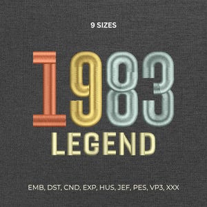 May include: Embroidered design with the year "1983" in orange, gold, and teal, and the word "LEGEND" below. The text "9 SIZES" is at the top. The design is on a dark grey textured background. Embroidery file formats are listed at the bottom.