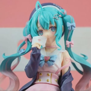 New Hatsune Miku Anime Figure - Pink Sakura Sitting Position PVC Action Figure