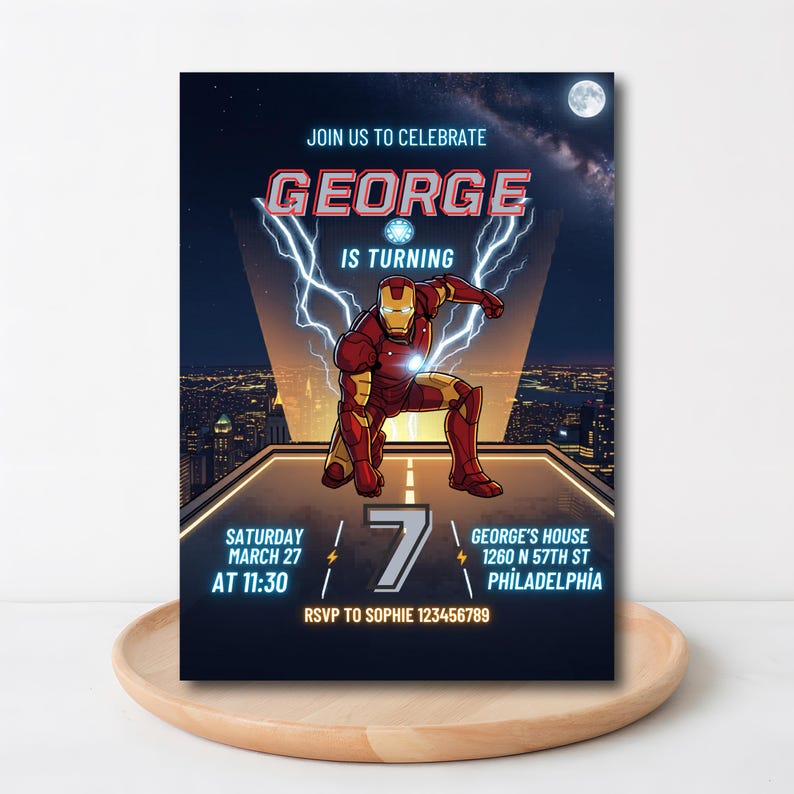 May include: A birthday party invitation featuring the text "JOIN US TO CELEBRATE GEORGE IS TURNING". The invitation includes an illustration of Iron Man, the number 7, and event details: Saturday, March 27 at 11:30, George's House, 1260 N 57th St, Philadelphia.