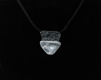 Silver pendant with contrasting mirror finish and stone textured components