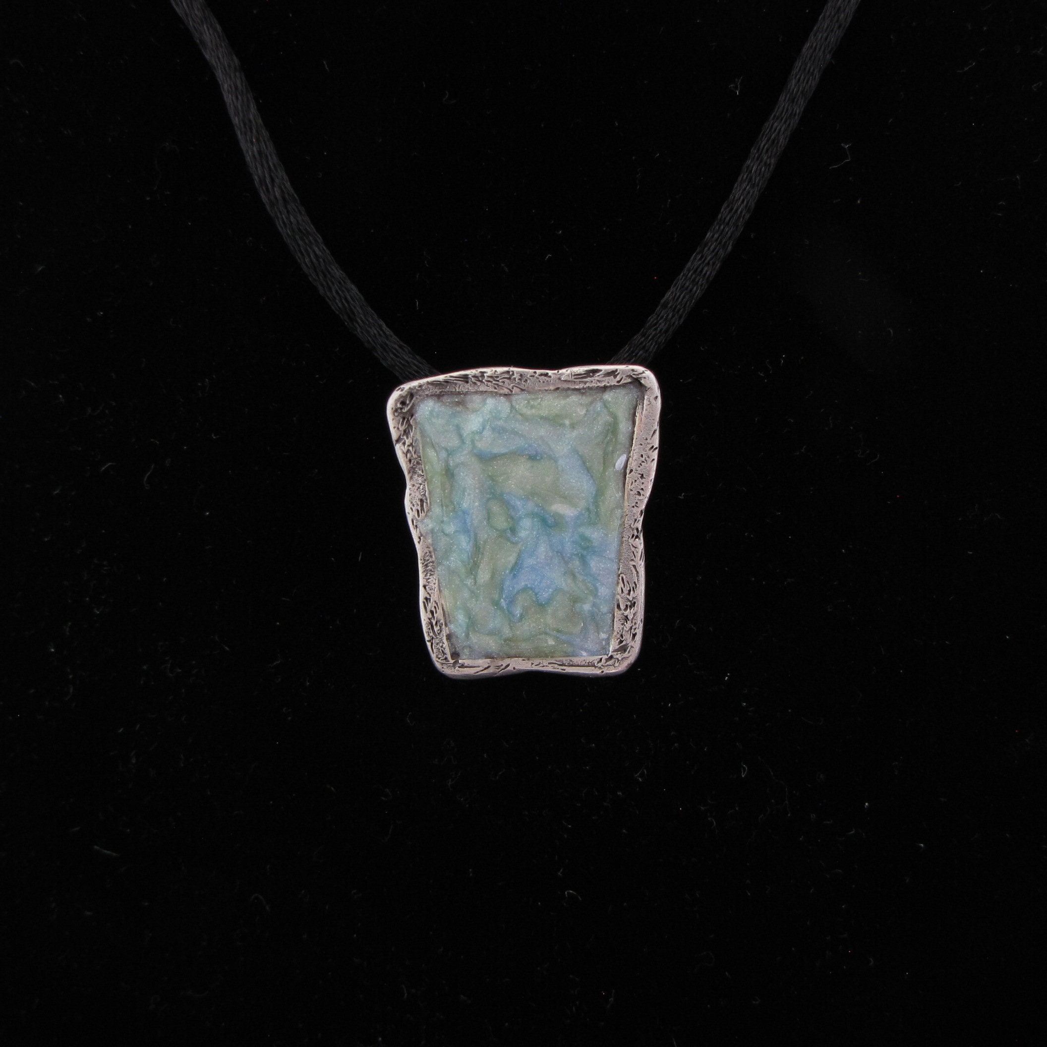 Antique style silver pendant with pastel green and blue faux enamel marbling