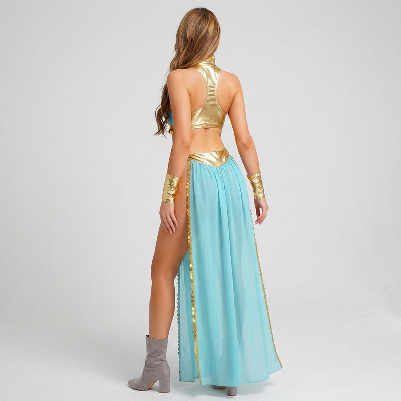 May include: A gold and blue costume with a halter top, arm cuffs, and a flowing skirt with a high slit. The skirt is light blue with gold trim. The costume is a fantasy or cosplay outfit.