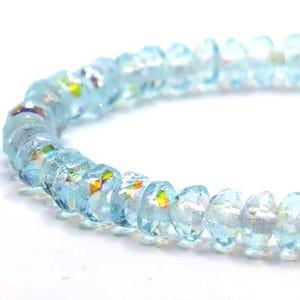 FP Baby Rondelle 2 x 3 mm, 50 stuks, lichtblauw transparant AB, gefacetteerd / BP_38