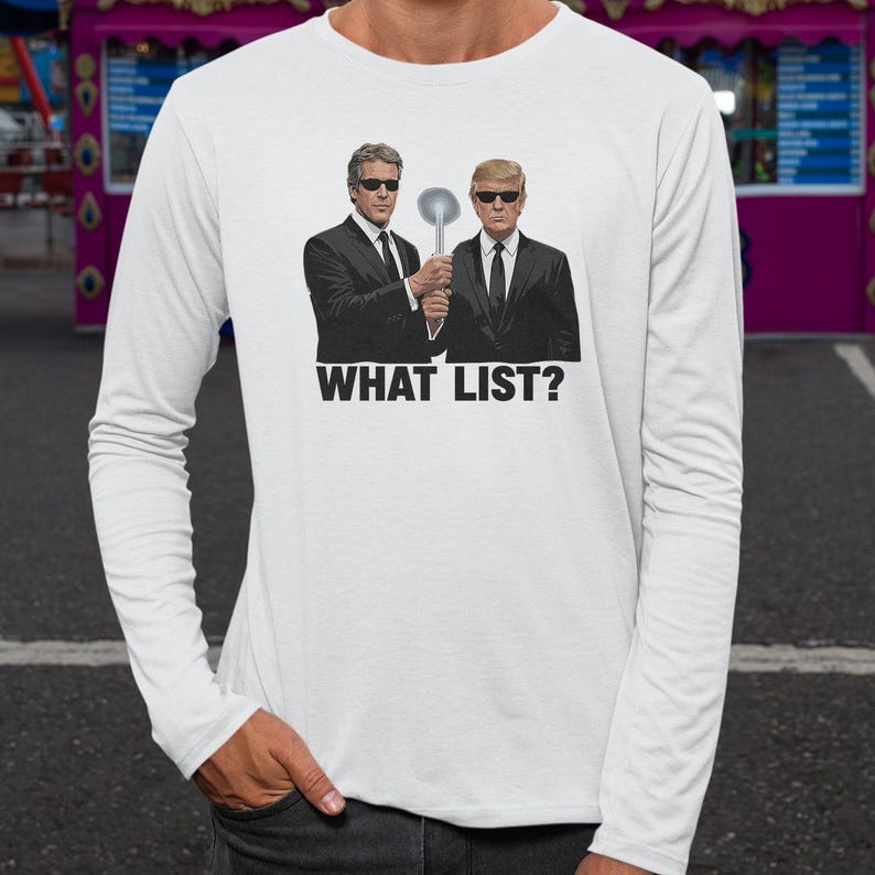 A person wearing a white long-sleeved shirt with a graphic design featuring two men in suits and sunglasses, holding a spoon, and the text "WHAT LIST?"