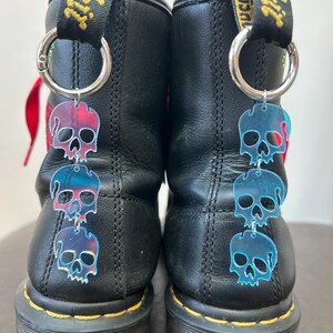 Iridescent triple skull boot charms