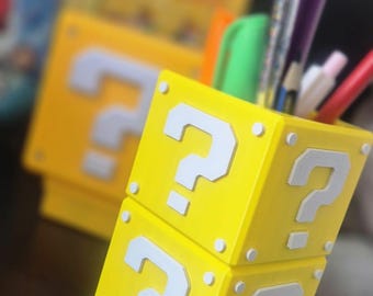 Portalápices con forma de bloque de preguntas – Edición Mario Bros 3D