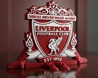Placa 3D del Liverpool FC con pernas articuladas
