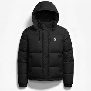 May include: Black puffer jacket with a hood and a white logo on the chest. The jacket has a full zipper closure and a drawstring hood. The jacket is designed for cold weather and is made of a durable, water-resistant material.