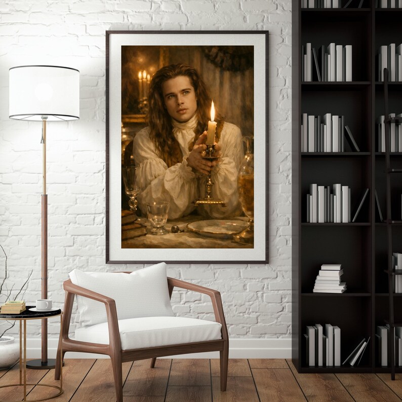 May include: A framed print of a man holding a lit candle. The man is wearing a white ruffled shirt and is seated at a table with glassware and a plate. The artwork has a vintage, romantic aesthetic.