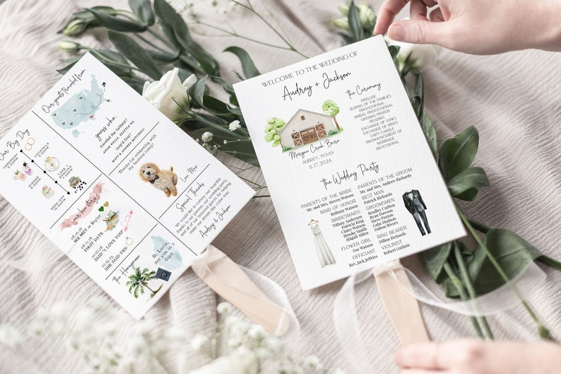 May include: Two wedding programs printed on fans. The left fan has a timeline of the couple's relationship with illustrations of rings, a cocktail, a cake, and a dog. The right fan has a watercolor illustration of a barn and the text "Welcome to the Wedding of Audrey + Jackson".