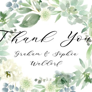 May include: Thank You card with a watercolor wreath of green leaves and white flowers. The text reads "Thank You Graham & Sophia Waldorf".