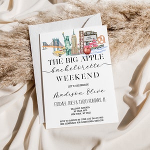 May include: A white invitation card with a watercolor illustration of New York City landmarks, including the Statue of Liberty, the Brooklyn Bridge, and a yellow taxi cab. The text on the card reads "The Big Apple Bachelorette Weekend" and includes the name "Madison Olive" and the date "Friday, July 8 thru Sunday, 11".