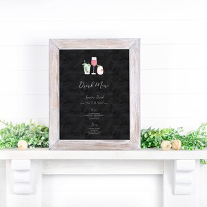 May include: A black chalkboard sign with a white wooden frame, displaying a drink menu with the title "Drink Menu". The menu lists "Sparkling Drink", "Wine", and "Beer" options. The sign is decorated with small watercolor illustrations of drinks.