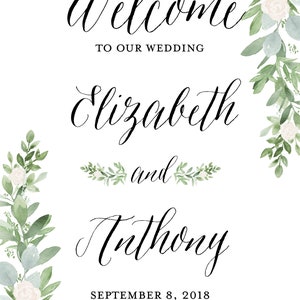 Peut inclure: Panneau de mariage blanc avec une calligraphie &eacute;l&eacute;gante indiquant &laquo;&nbsp;Bienvenue &agrave; notre mariage&nbsp;&raquo;. Les noms &laquo;&nbsp;Elizabeth et Anthony&nbsp;&raquo; sont indiqu&eacute;s, ainsi que la date du &laquo;&nbsp;8 septembre 2018&nbsp;&raquo;. Le panneau est orn&eacute; de motifs floraux et de verdure.