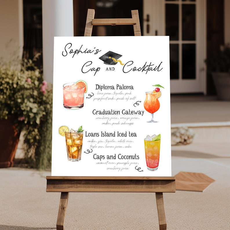 May include: A white sign with a watercolor illustration of four cocktails and their recipes. The sign says "Sophia's Cap and Cocktail" and lists the drinks as "Diploma Paloma", "Graduation Gateway", "Loans Island Iced Tea", and "Caps and Coconuts".