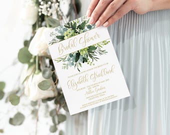 Puede incluir: Una tarjeta de invitación rectangular para despedida de soltera con fondo blanco y un arreglo botánico de acuarela de hojas verdes y pequeñas flores blancas en la parte superior. El texto dice Bridal Shower, Elizabeth Strickland y detalles del evento.