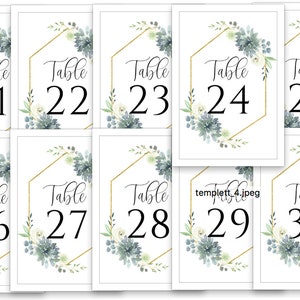 May include: Ten table number cards with a gold geometric frame and watercolor floral design. The numbers range from 21 to 30.