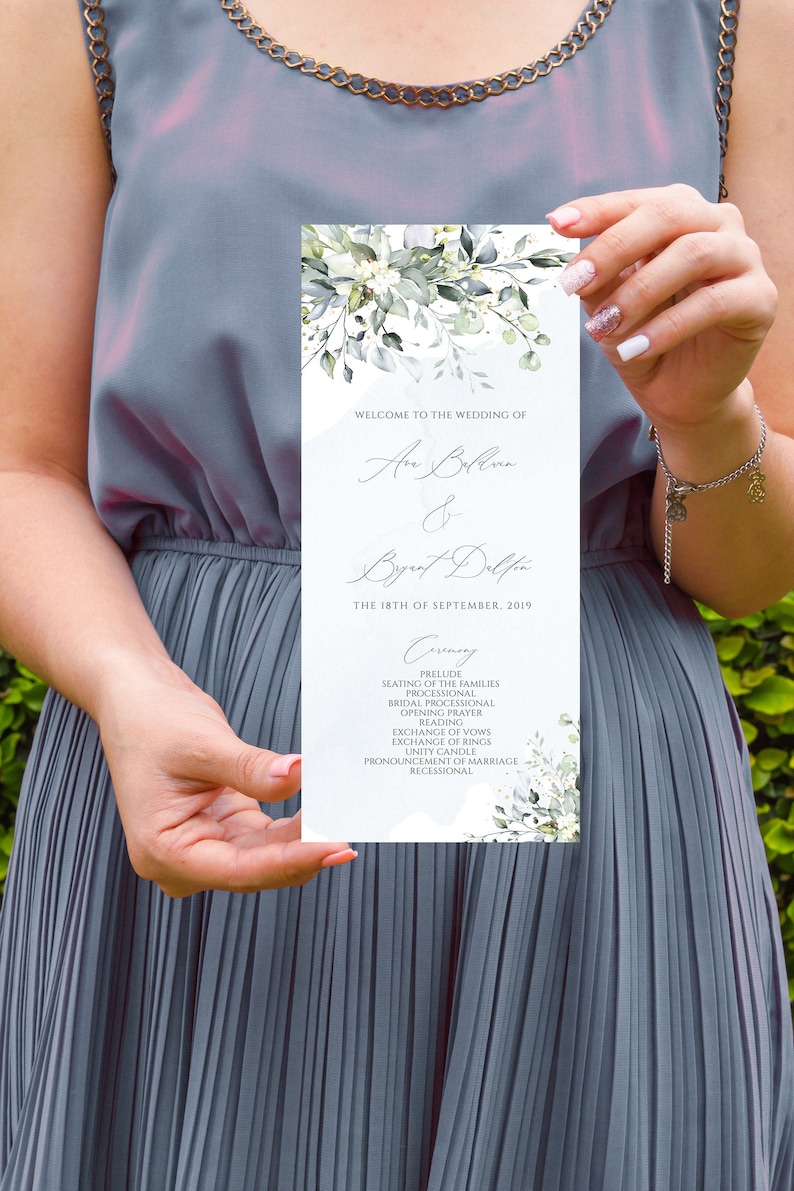 May include: Wedding ceremony program with a watercolor floral design in shades of green and blue. The program lists the order of events for the wedding of Ana Beltre and Bryant Delfin on September 18, 2019.