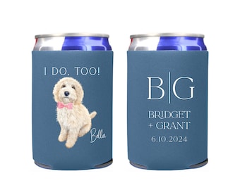May include: Two blue can coolers with white text. One cooler features a doodle of a dog with a pink bow tie and the text "I do, too! Bella". The other cooler has the text "B|G Bridget + Grant 6.10.2024".