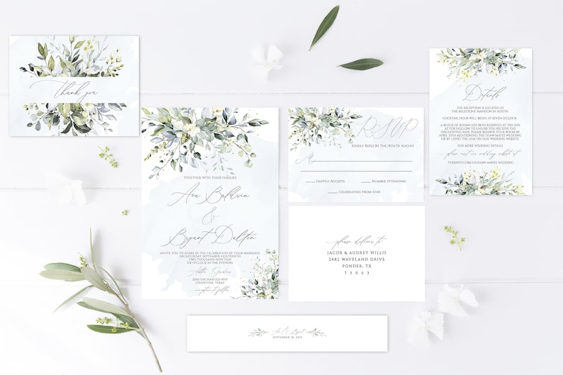 May include: A set of wedding invitation cards with a watercolor design of green leaves and white flowers. The cards include the invitation, RSVP, details, and a thank you card. The text on the invitation reads "Ann Bollen & Bryant Dalton".
