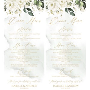 K&ouml;nnte beinhalten: Ein Hochzeitsmen&uuml; mit floralem Design. Das Men&uuml; umfasst Vorspeisen, Hauptgericht, Dessert und eine Dankesbotschaft an die G&auml;ste. Das Men&uuml; ist mit "Dinner Menu" betitelt und in goldener Schreibschrift gehalten. Das Men&uuml; enth&auml;lt folgende Gerichte: Gebratene rote Paprikasuppe mit Koriander, Cr&egrave;me fra&icirc;che, Gemischter Salat mit cremiger Caesar-Dressing, Gegrilltes Filet Mignon mit Knoblauchp&uuml;ree, Gebratenes Gem&uuml;se in einer Zinfandel-Reduktionsglasur, Gebratener Heilbutt auf einem Tomaten-Risotto-Kuchen, serviert mit leicht ger&auml;uchertem S&uuml;ssmais, Gebratenes Gem&uuml;se aus dem Garten, gew&uuml;rzt in einem Bett aus cremiger Pasta Primavera, Hochzeitstorte, Dreist&ouml;ckige deutsche Schokoladen-Torte. Das Men&uuml; endet mit einer Dankesbotschaft an die G&auml;ste: "Vielen Dank, dass Sie mit uns feiern!" gefolgt von den Namen des Paares, Isabelle & Andrew, und dem Datum, 18. Juli 2020.