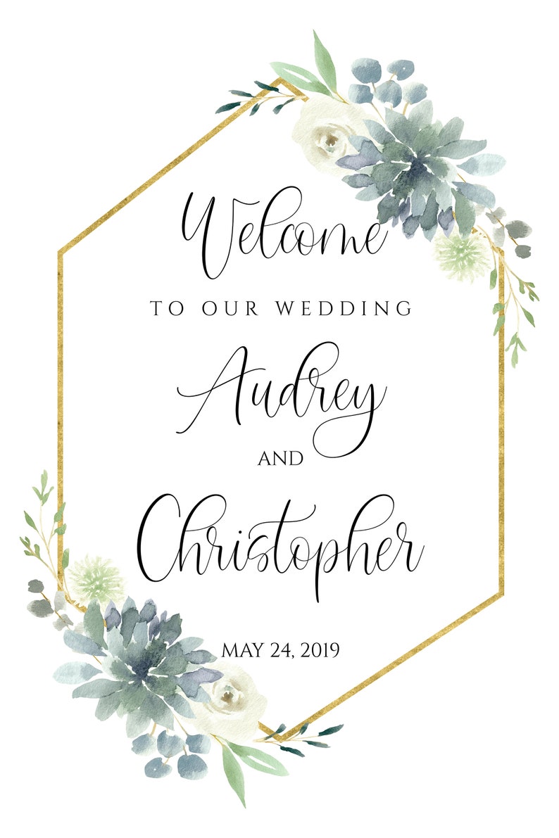 May include: A gold hexagonal frame with a watercolor floral design in shades of blue and green. The text inside the frame reads "Welcome to our wedding Audrey and Christopher May 24, 2019".