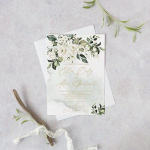May include: A white wedding invitation with green watercolor floral details and gold lettering. The invitation reads "Ella Daly and Alex Upchurch".