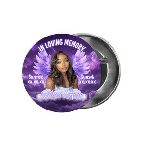 May include: A round button with a purple background featuring a portrait of a person with angel wings. The text "IN LOVING MEMORY" arches across the top. The words "Sunrise" and "Sunset" flank the portrait.
