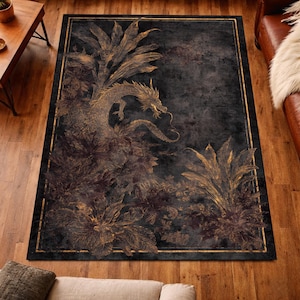 May include: A rectangular rug with a dark background and a gold dragon design. The rug has a gold border and gold botanical elements. The dragon is in the centre of the rug, with its body intertwined with the plants.