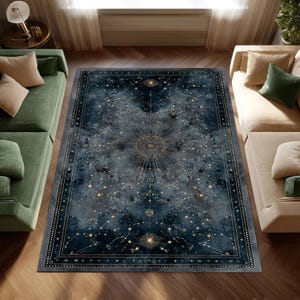 May include: A rectangular rug with a celestial design. The rug features a dark blue background with a gold constellation pattern. The design includes stars, lines, and a central sunburst. The rug is bordered with a dotted pattern.