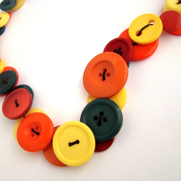 Long Button Necklace in shades of red, orange and yellow