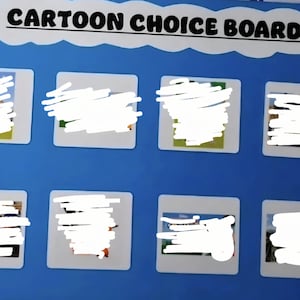May include: A blue board displaying the text "CARTOON CHOICE BOARD". It features eight picture slots with blurred images, each framed in white. The board is designed for cartoon selection.