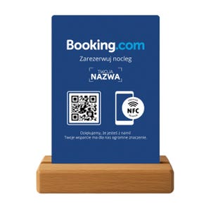 May include: A blue Booking.com sign with white text and a QR code, set in a wooden holder. The sign includes the text "Zarezerwuj nocleg" and "TWOJA NAZWA". The sign also has a phone icon with "NFC" on it.