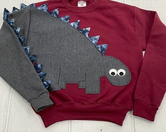 CLEARANCE Youth dinosaur shirt with charcoal dinosaur with blue spikes. Size youth medium FREE US Shipping