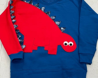 CLEARANCE Youth dinosaur shirt with red dinosaur with blue spikes. Size youth medium FREE US Shipping