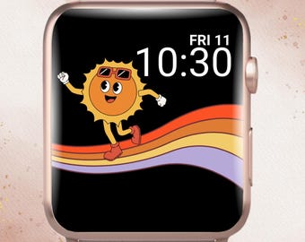 May include: A rose gold smartwatch with a black screen displaying a cartoon sun wearing sunglasses and running over a rainbow. The time is 10:30 on Friday, the 11th. The watch has a light gray band and the words "In Bloom Babe" are at the top.