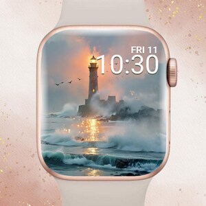 Puede incluir: Un reloj inteligente con caja de oro rosa y correa blanca muestra una escena de faro al atardecer. La pantalla muestra la hora 10:30 el viernes. El texto "In Bloom Babe" está en la parte superior.