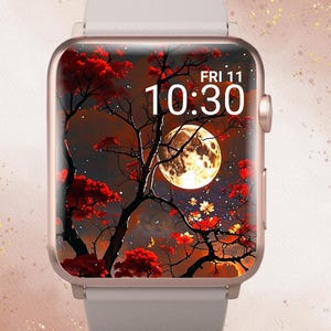 May include: A rose gold smartwatch with a white band displays a digital screen featuring a nighttime landscape with a full moon, red trees, and the text "FRI 11 10:30". The words "In Bloom Babe" are at the top.