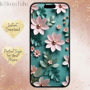 May include: A smartphone displaying a digital wallpaper featuring light pink flowers with metallic gold centers and textured teal green leaves on a solid teal background. The screen shows a floral pattern with various sizes of blossoms and foliage.