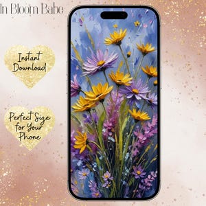 Peut inclure: Un écran de téléphone affiche une peinture florale avec des fleurs jaunes et violettes sur fond bleu. Les mots "In Bloom Babe", "Instant Download" et "Perfect Size for Your Phone" sont également visibles.