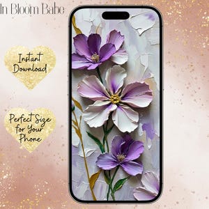 May include: A phone case featuring a floral design with purple and white flowers. The case has a textured, painted appearance with the words "In Bloom Babe" at the top. Two gold heart-shaped graphics read "Instant Download" and "Perfect Size for Your Phone."